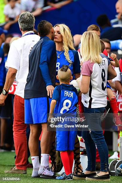 Dimitri Payet of France with his wife Ludivine Payet and two of his sons after the European Championship match Round of 16 between France and...