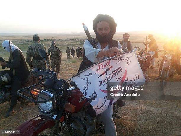 Afghan security forces are seen after an operation against Taliban in the Faryab province of Afghanistan on June 27, 2016. It has been said that 10...