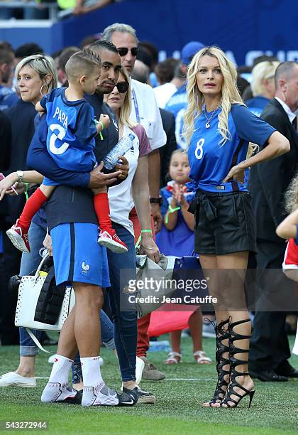 Dimitri Payet of France meets his wife Ludivine Payet and his younger son Noa Payet following the UEFA EURO 2016 round of 16 match between France and...