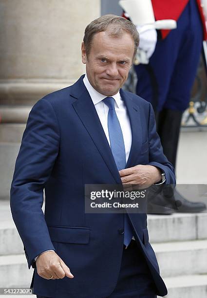 President of the European Council Donald Tusk leaves after a meeting with French President Francois Hollande at the Elysee Presidential Palace on...