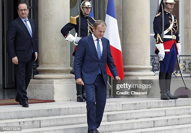 President of the European Council Donald Tusk leaves after a meeting with French President Francois Hollande at the Elysee Presidential Palace on...