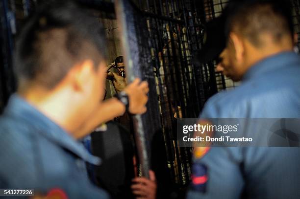 Drug suspects are led into a crowded jail cell on June 20, 2016 in Manila, Philippines. The president-elect of the Philippines, Rodrigo Duterte,...