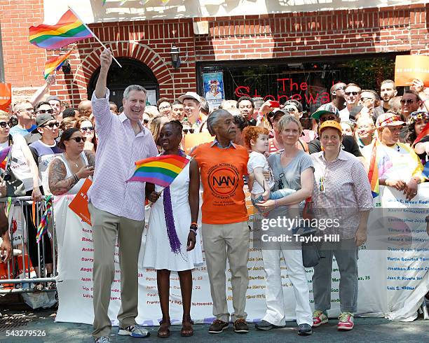 Bill de Blasio, Chirlane McCray, Al Sharpton, Cynthia Nixon, Max Ellington Nixon-Marinoni, and Christine Marinoni participate in the 2016 Pride March...