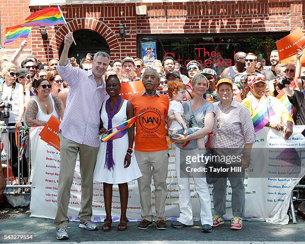 Bill de Blasio, Chirlane McCray, Al Sharpton, Cynthia Nixon, Max Ellington Nixon-Marinoni, and Christine Marinoni participate in the 2016 Pride March...