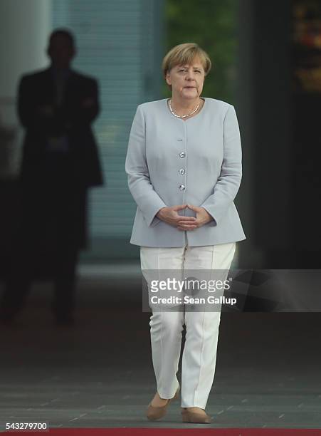 German Chancellor Angela Merkel waits for the arrival of Ukrainian Prime Minister Volodymyr Groysman at the Chancellery on June 27, 2016 in Berlin,...
