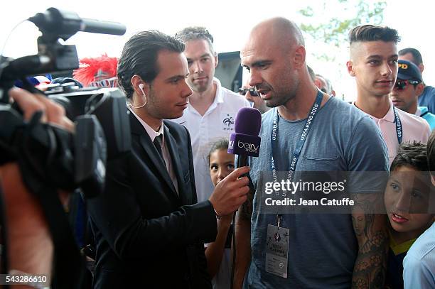 Former player of Lyon Cris is interviewed by beIN Sport before the UEFA EURO 2016 round of 16 match between France and Republic of Ireland at Stade...