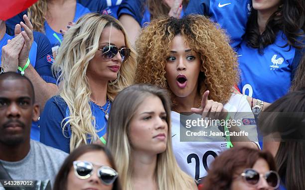 Ludivine Payet, wife of Dimitri Payet and Sephora Coman, wife of Kingsley Coman attend the UEFA EURO 2016 round of 16 match between France and...