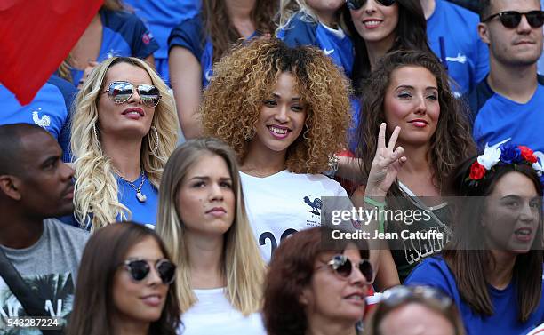 Ludivine Payet, wife of Dimitri Payet, Sephora Coman, wife of Kingsley Coman and Tiziri Digne, wife of Lucas Digne attend the UEFA EURO 2016 round of...