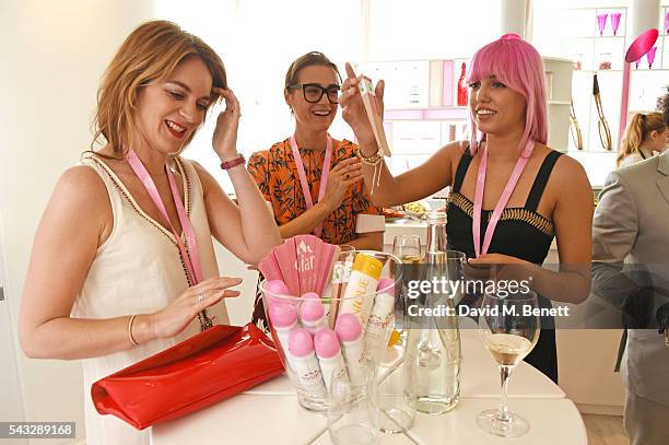 Felicity Blunt, Yasmin Le Bon and Amber Le Bon attend the evian Live Young suite during Wimbledon 2016 at the All England Tennis and Croquet Club on...