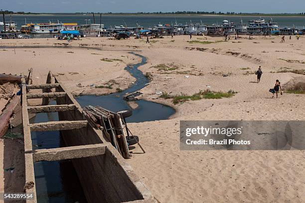 Open sewage disposed directly in Tocantins river, a tributary of Amazon river, at Santarem city harbor, Para State, Brazil.