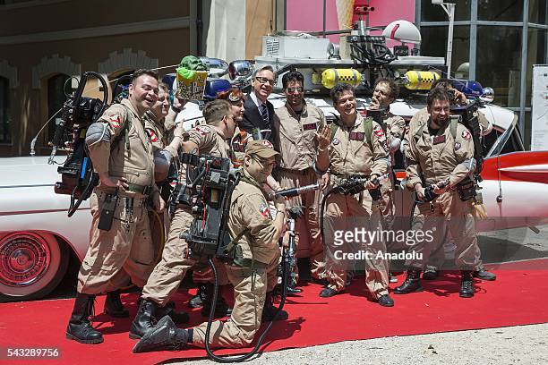 Director Paul Feig poses with walk-on ghostbusters during "GHOSTBUSTERS" photocall at the House of Cinema Villa Borghese on June 27, 2016 in Rome,...