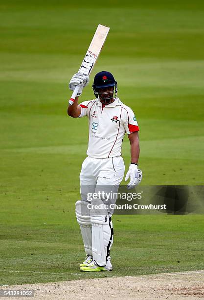 Alviro Petersen of Lancashire celebrates his century and a half duriung day two of the Specsavers County Championship division one match between...
