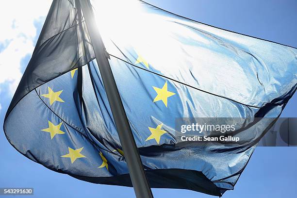 The flag of the European Union flies at the Chancellery on June 27, 2016 in Berlin, Germany. German Chancellor Angela Merkel is scheduled to receive...