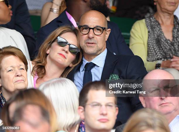 Felicity Blunt and Stanley Tucci attend day one of the Wimbledon Tennis Championships at Wimbledon on June 27, 2016 in London, England.