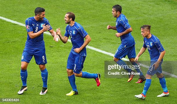 Giorgio Chiellini of Italy celebrates scoring the opening goal withi his team mates Graziano Pelle , Eder and Emanuele Giaccherini during the UEFA...