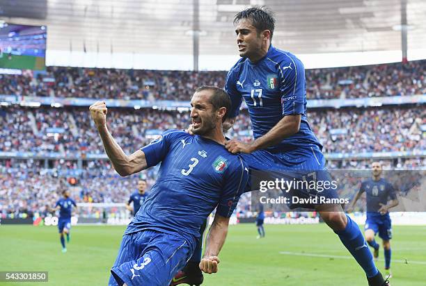 Giorgio Chiellini of Italy celebrates scoring with Eder after scoring the opening goal with his team mate Eder during the UEFA EURO 2016 round of 16...