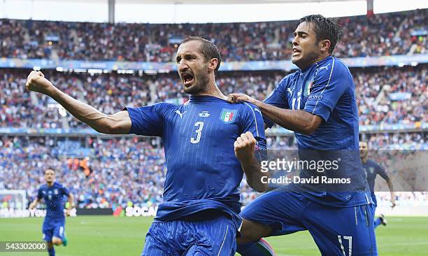Giorgio Chiellini of Italy celebrates scoring with Eder after scoring the opening goal with his team mate Eder during the UEFA EURO 2016 round of 16...