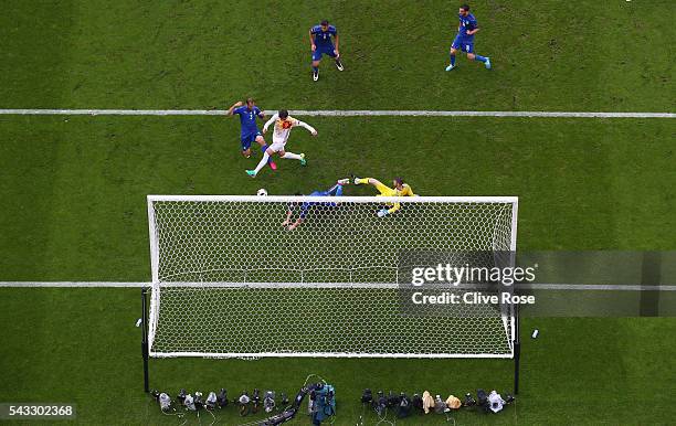 Giorgio Chiellini of Italy scores the opening goal during the UEFA EURO 2016 round of 16 match between Italy and Spain at Stade de France on June 27,...