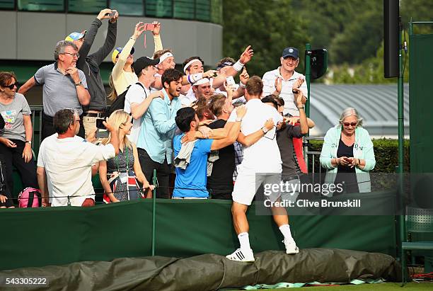 Marcus Willis of Great Britain celebrates victory during the Men's Singles first round match against Ricardas Berankis of Lithuania on day one of the...