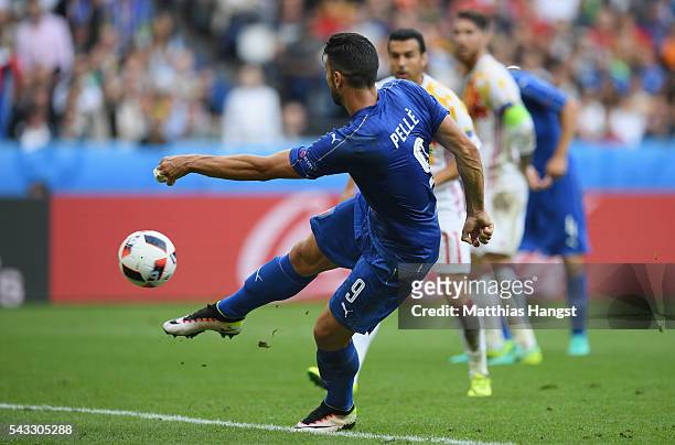 Graziano Pelle of Italy scores his team's second goal during the UEFA EURO 2016 round of 16 match between Italy and Spain at Stade de France on June...
