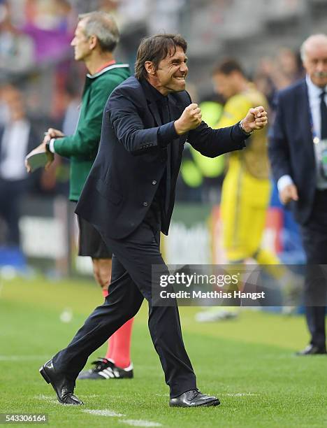 Antonio Conte head coach of Italy celebrates his team's 2-0 win after the UEFA EURO 2016 round of 16 match between Italy and Spain at Stade de France...