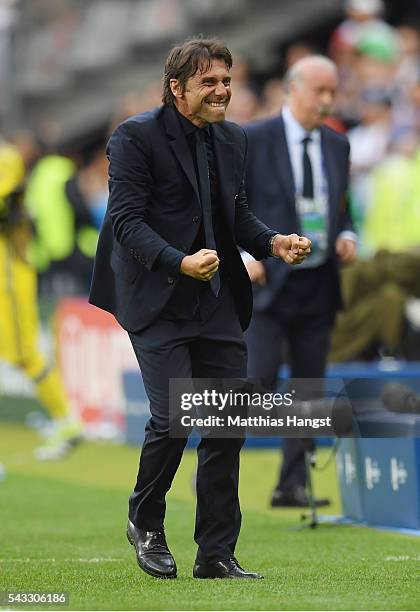 Antonio Conte head coach of Italy celebrates his team's 2-0 win after the UEFA EURO 2016 round of 16 match between Italy and Spain at Stade de France...