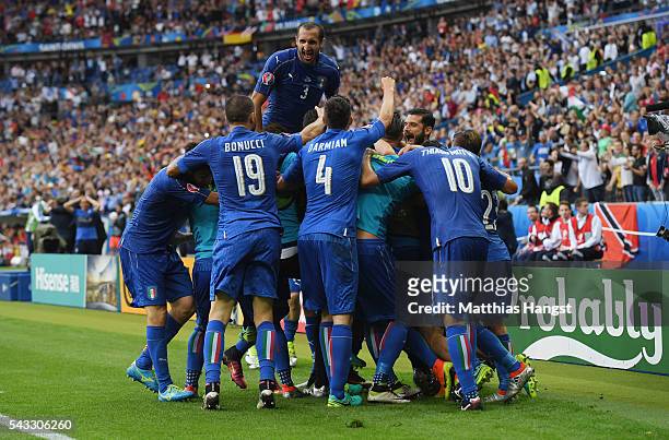 Italy players celebrate their team's second goal by Graziano Pelle during the UEFA EURO 2016 round of 16 match between Italy and Spain at Stade de...