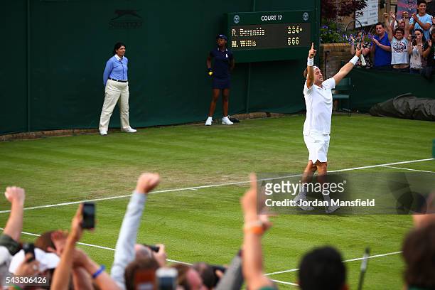 Marcus Willis of Great Britain celebrates victory during the Men's Singles first round match against Ricardas Berankis of Lithuania on day one of the...