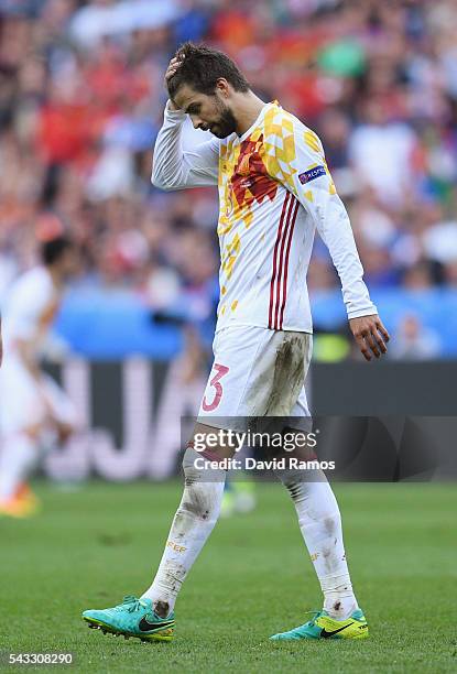 Gerard Pique of Spain reacts after missing a chance during the UEFA EURO 2016 round of 16 match between Italy and Spain at Stade de France on June...