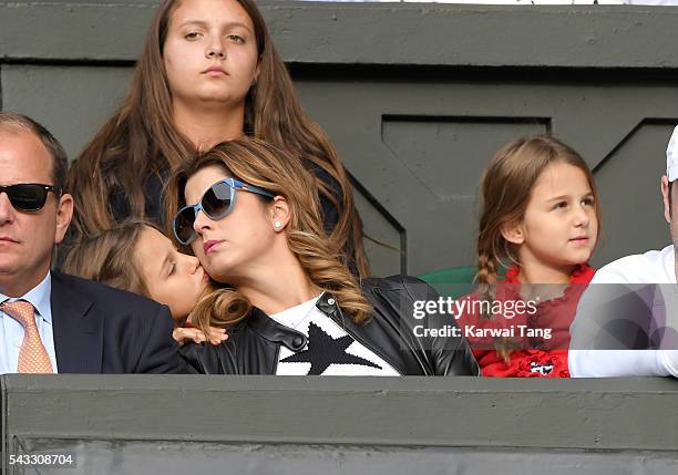 Mirka Federer and twin daughters Myla Rose Federer and Charlene Riva Federer attend day one of the Wimbledon Tennis Championships at Wimbledon on...