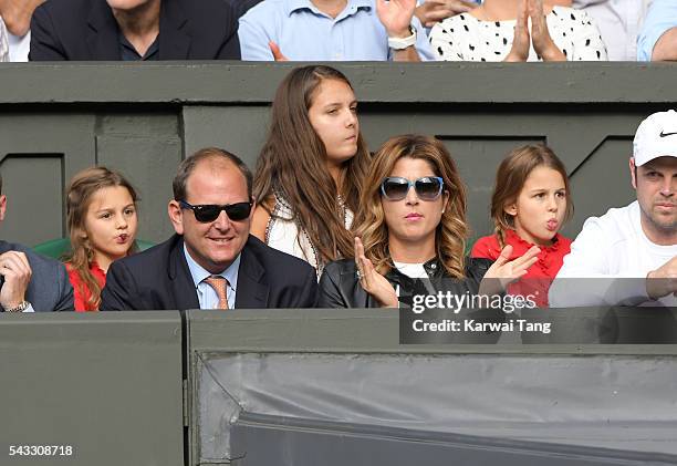 Mirka Federer and twin daughters Myla Rose Federer and Charlene Riva Federer attend day one of the Wimbledon Tennis Championships at Wimbledon on...