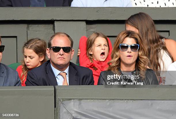 Mirka Federer and twin daughters Myla Rose Federer and Charlene Riva Federer attend day one of the Wimbledon Tennis Championships at Wimbledon on...