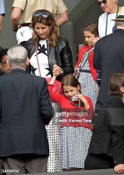 Mirka Federer and twin daughters Myla Rose Federer and Charlene Riva Federer attend day one of the Wimbledon Tennis Championships at Wimbledon on...