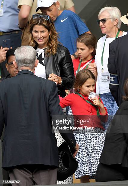 Mirka Federer and twin daughters Myla Rose Federer and Charlene Riva Federer attend day one of the Wimbledon Tennis Championships at Wimbledon on...