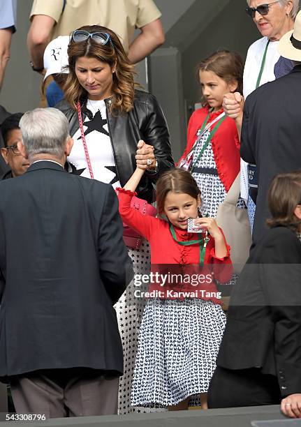 Mirka Federer and twin daughters Myla Rose Federer and Charlene Riva Federer attend day one of the Wimbledon Tennis Championships at Wimbledon on...