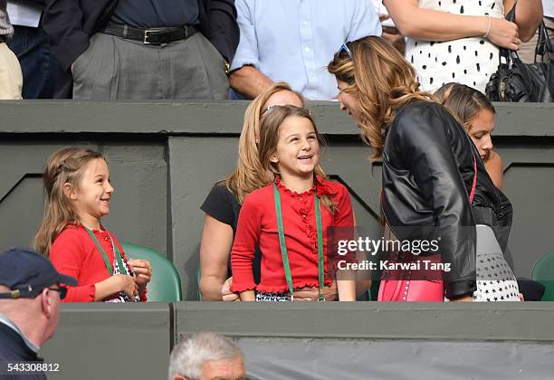 Mirka Federer and twin daughters Myla Rose Federer and Charlene Riva Federer attend day one of the Wimbledon Tennis Championships at Wimbledon on...