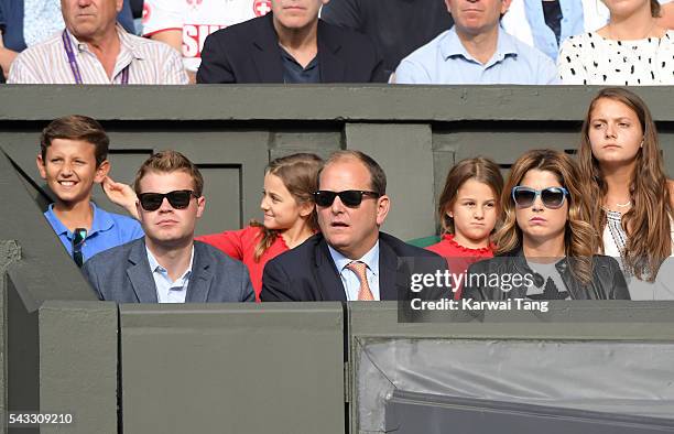 Mirka Federer and twin daughters Myla Rose Federer and Charlene Riva Federer attend day one of the Wimbledon Tennis Championships at Wimbledon on...