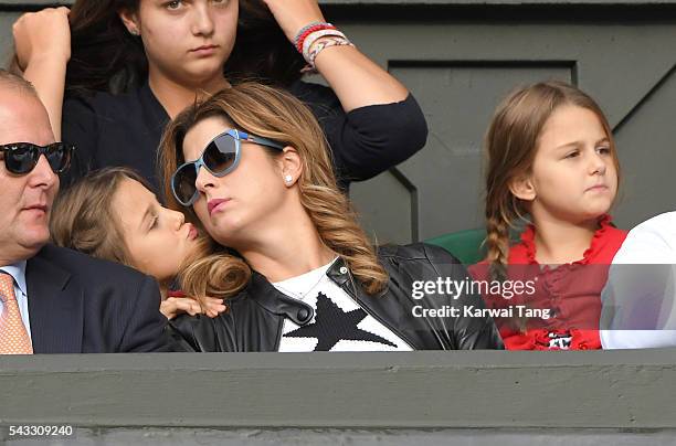 Mirka Federer and twin daughters Myla Rose Federer and Charlene Riva Federer attend day one of the Wimbledon Tennis Championships at Wimbledon on...