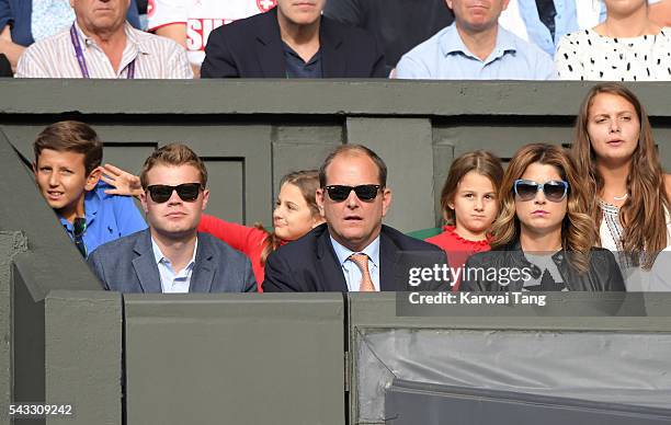 Mirka Federer and twin daughters Myla Rose Federer and Charlene Riva Federer attend day one of the Wimbledon Tennis Championships at Wimbledon on...