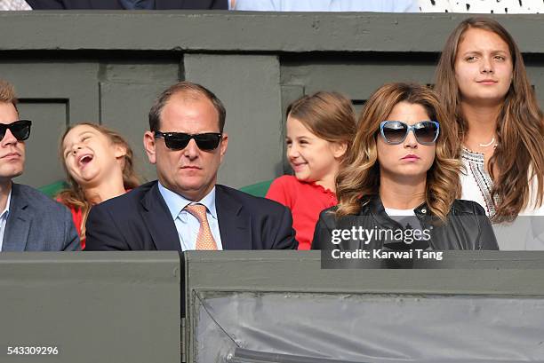 Mirka Federer and twin daughters Myla Rose Federer and Charlene Riva Federer attend day one of the Wimbledon Tennis Championships at Wimbledon on...