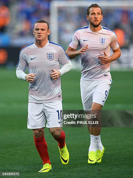 England's forward Wayne Rooney and England's forward Harry Kane warm up prior to the Euro 2016 round of 16 football match between England and Iceland...