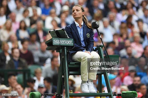 Eva Asderaki-Moore watches on during the Men's Singles first round match between Roger Federer of Switzerland and Giodo Pella of Argentina on day one...