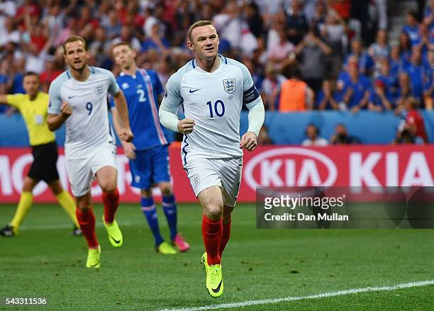 Wayne Rooney of England celebrates scoring the opening goal during the UEFA EURO 2016 round of 16 match between England and Iceland at Allianz...