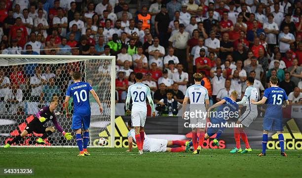 Kolbeinn Sigthorsson of Iceland scores his team's second goal past Joe Hart of England during the UEFA EURO 2016 round of 16 match between England...