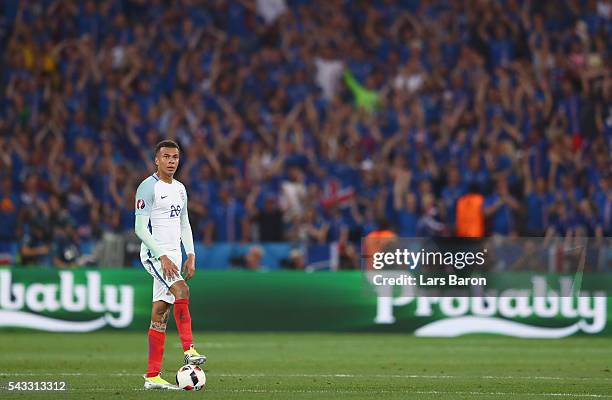 Dele Alli of England reacts after Iceland's second goal during the UEFA EURO 2016 round of 16 match between England and Iceland at Allianz Riviera...