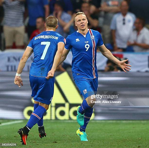 Kolbeinn Sigthorsson of Iceland celebrates scoring his team's second goal with his team mate Johann Gudmundsson during the UEFA EURO 2016 round of 16...