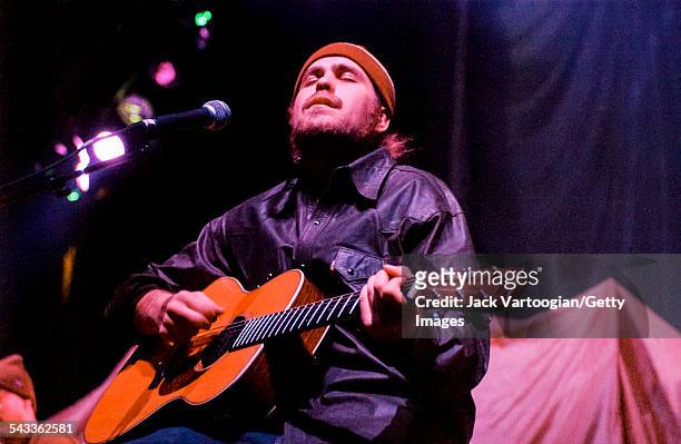 American musician Citizen Cope plays guitar as he performs onstage at the Hammerstein Ballroom, New York, New York, March 4, 2002.
