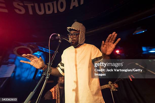 Kenyan musician Bill 'Blinky' Sellanga leads Hip-Hop/R&B/Disco group Just A Band on stage at the 12th Annual GlobalFest at Webster Hall's Studio...