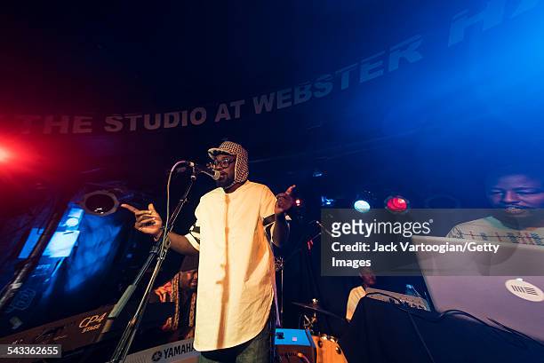 Kenyan musicians Bill 'Blinky' Sellanga and DJ Daniel Muli, on electronics, perform with Hip-Hop/R&B/Disco group Just A Band on stage at the 12th...