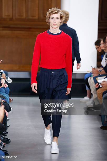 Model walks the runway during the Officine Generale Menswear Spring/Summer 2017 show designed by Pierre Mahéo as part of Paris Fashion Week on June...